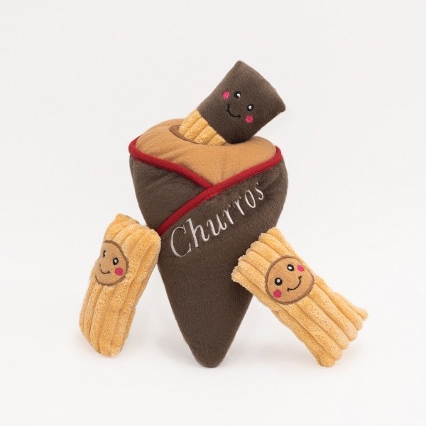 ZippyPaws Zippy Burrows Churro Cone Vers uit de Zippy keuken zijn deze heerlijke Churro's, in de smaken kaas, vegetarisch en pepperoni. De ZippyPaws Zippy Burrows Churro Cone is een geweldig  verstop-spelletje om samen met jouw hond te spelen. De 3 piepende pluche churro's moeten uit de puntzak worden gehaald. De ZippyPaws Zippy Burrows Churro Cone houdt je hond lekker bezig, voorkomt verveling en bevordert mentale stimulatie. Formaat: 16 x 15 Let op: Er is geen enkel hondenspeelgoed in de wereld wat niet kapot kan. Ondanks de algehele stevigheid van het speelgoed, zou het kapot kunnen gaan. Op hondenspeelgoed zit geen garantie. Kies dus het juiste soort speeltje voor jouw hond zijn kauw- en speelbehoefte. Haal kapotte speeltjes meteen weg en laat jouw hond alleen spelen onder toezicht. ZippyPaws Hondenspeelgoed Hondenspeeltjes van het merk ZippyPaws staan garant voor de allerleukste designs en zijn goed voor urenlang speelplezier. De hondenspeeltjes van ZippyPaws zijn ontworpen door hondenmensen voor honden. En dat zie je aan alles. ZippyPaws Burrows De Zippypaws Burrows zijn zoekspellen voor de hond. In iedere Burrow zitten 3 piepbeestjes verstopt. Speciaal voor honden die niet enthousiast worden van hersenwerkjes met voer zijn de Burrows perfect. Want de beloning is geen voer, maar een klein piepspeeltje. Je kunt de speeltjes zo vaak terug stoppen als je wilt, zodat jouw hond weer op zoek kan! Alle delen van de Zippy Burrows zijn gemaakt van hoogwaardig pluche stof. Daardoor is het niet alleen geschikt als interactief speeltje, maar kan het ook gebruikt worden als knuffelspeeltje. Alle speeltjes in de Burrows bevatten een ronde pieper om je hond extra enthousiast te maken. Interactief hondenspeelgoed bestellen Alle honden hebben speelgoed nodig. Het geeft zowel een mentale- als lichamelijke uitdaging voor je hond! Interactief hondenspeelgoed is niet alleen belangrijk om je hond tevreden te houden en verveling te voorkomen. Het is ook nuttig om problematisch gedrag aan te pakken, zoals destructief kauwen of hinderlijk blaffen. Zippypaws Burrows De Zippypaws Burrows zijn zoekspellen voor de hond. In iedere Burrow zitten 3 piepbeestjes verstopt. Speciaal voor honden die niet enthousiast worden van hersenwerkjes met voer zijn de Burrows perfect. Want de beloning is geen voer, maar een klein piepspeeltje. Je kunt de speeltjes zo vaak terug stoppen als je wilt, zodat jouw hond weer op zoek kan! Alle delen van de Zippy Burrows zijn gemaakt van hoogwaardig pluche stof. Alle speeltjes in de Burrows bevatten een ronde pieper om je hond extra enthousiast te maken. Doordat zowel de Burrow als de speeltjes in de Burrow van pluche zijn gemaakt is het niet alleen geschikt als interactiefspeeltje, maar kan het ook gebruikt worden als knuffelspeeltje. ZippyPaws Donutz Het populairste speeltje van Zippypaws is de Donut. Al in 2017 werd de miljardste donut verkocht. Voor de hond zijn de donut speeltjes helemaal geweldig. Er zitten 2 half ronde piepers in, waardoor het niet uitmaakt waar je in de donut bijt. Piepen doet de Zippypaws Donut altijd! De Donutz bevatten verder geen zachte pluche vulling. Ideaal voor honden die het normaal altijd laten sneeuwen in huis. Bekend van Instagram Als jij honden volgt via Instagram, dan kan het niet missen dat je de ZippyPaws hondenspeeltjes wel eens voorbij hebt zien komen. Niet zo gek want de grappige en interactieve speeltjes zijn perfect voor een geweldige foto samen met jouw hond. Vergeet je A Lot for Doodles niet te taggen op Instagram? ZippyPaws Nederland ZippyPaws hondenspeelgoed komt uit Amerika. Sinds een aantal jaren zijn de speeltjes ook in Nederland verkrijgbaar. Wij van A Lot for Doodles zijn trots dat we ZippyPaws verkopen in onze webshop. Bezoek onze shop en ontdek alle leuke speeltjes van ZippyPaws! ZippyPaws online bestellen De ZippyPaws hondenspeeltjes zijn bij ons online te bestellen. Naast de leuke speeltjes van ZippyPaws kun je ook bij ons terecht voor de merken Huxley & Kent, PawStory, HugSmart, Sodapup, Soos Pets, Cowboy Magic, Bass Brushes, P.L.A.Y., Yakka's & Carniwell. Heb je advies nodig? Neem gerust contact met ons op. We helpen je graag!